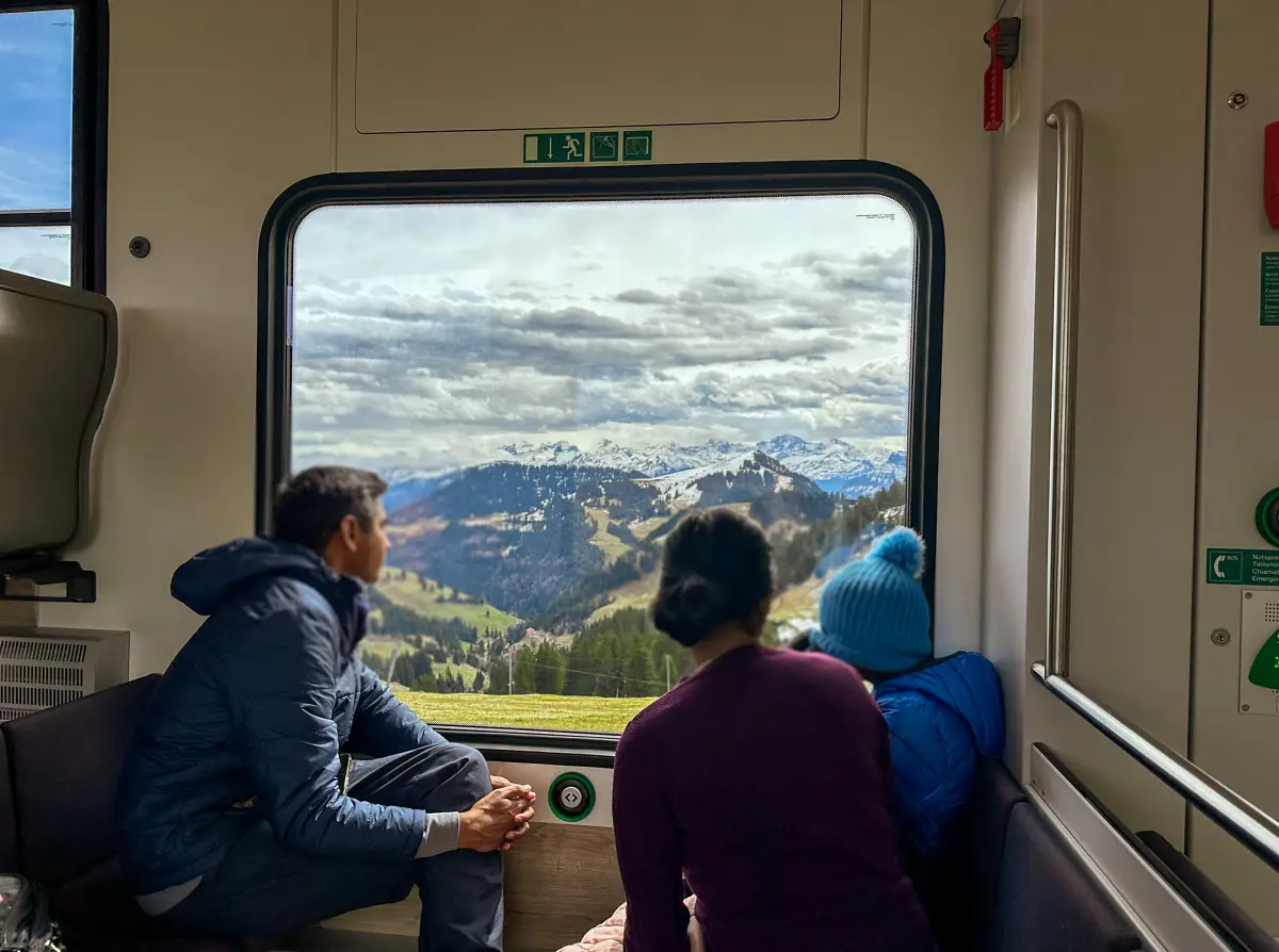 Mount Rigi cogwheel train ascending from Vitznau station with Lake Lucerne views